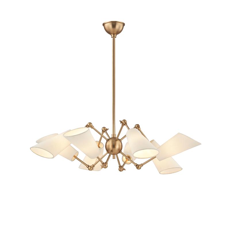 Buckingham aged brass chandelier with adjustable arms and white linen shades.