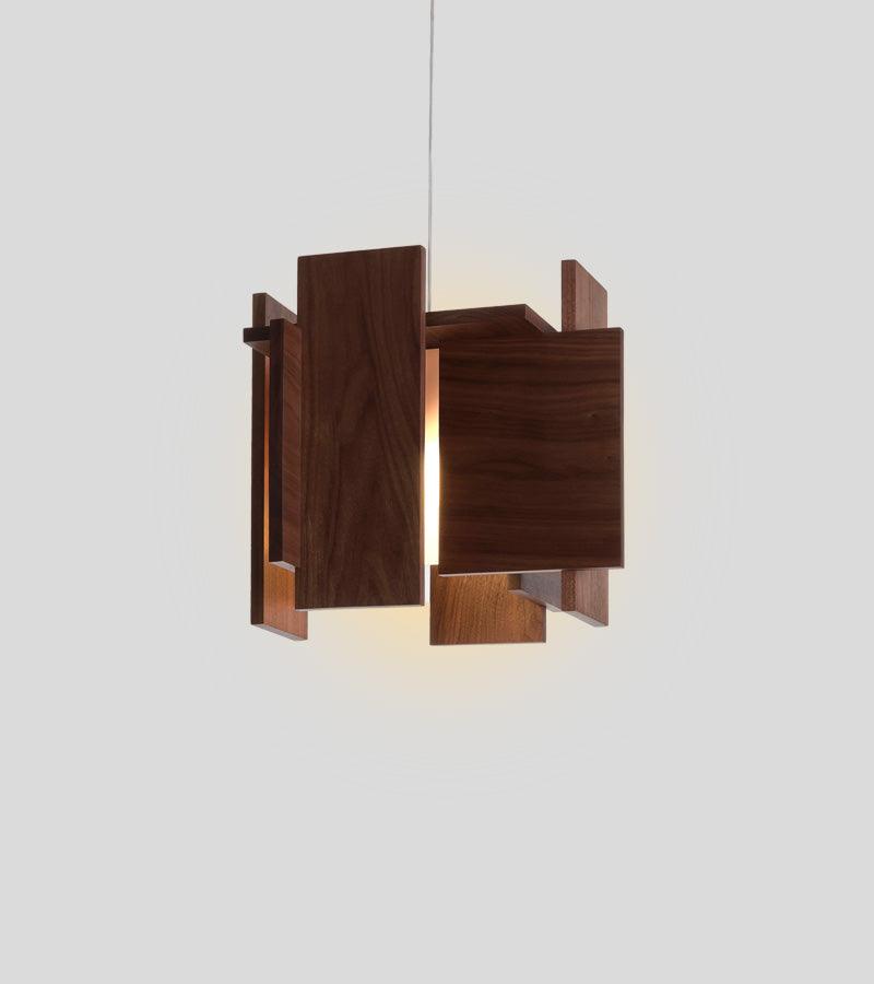 Abeo pendant light with dark wood panels and warm glowing LED light