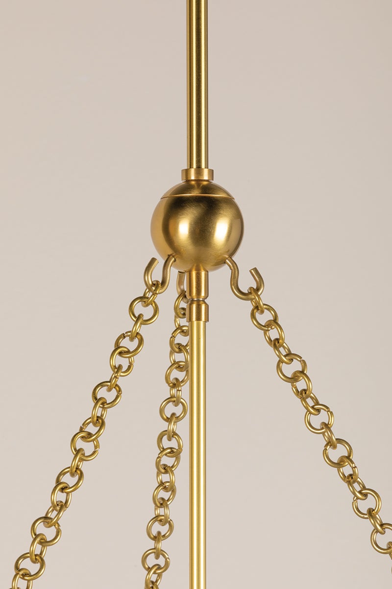 Aged brass chain work and metal ball detail on the Alana Pendant light fixture.