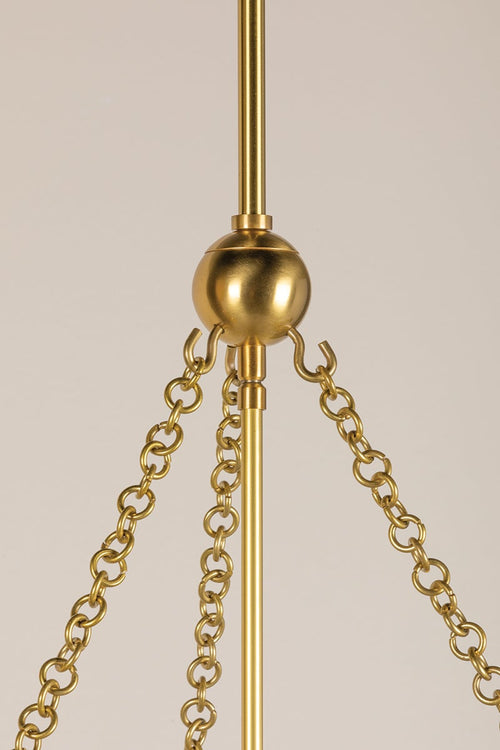 Aged brass chain work and metal ball detail on the Alana Pendant light fixture.