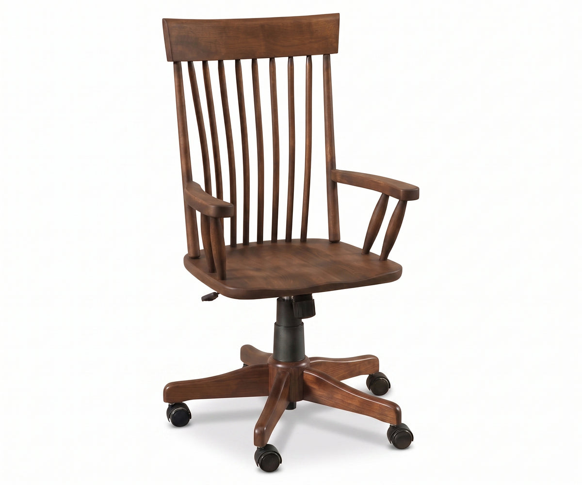 Albany wooden desk chair in a dark brown finish with a spindle back, armrests, and a wheeled swivel base.