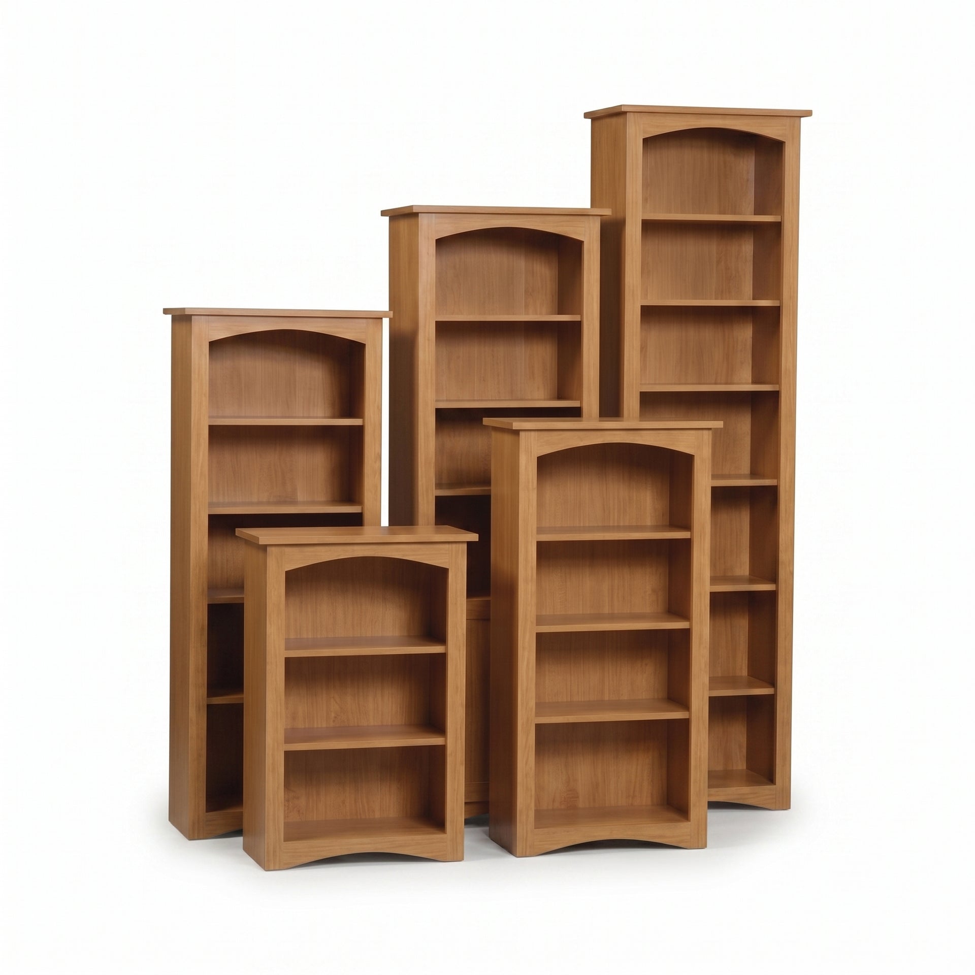 Five natural cherry Arch Bookcases in varying heights with arched tops and bottoms