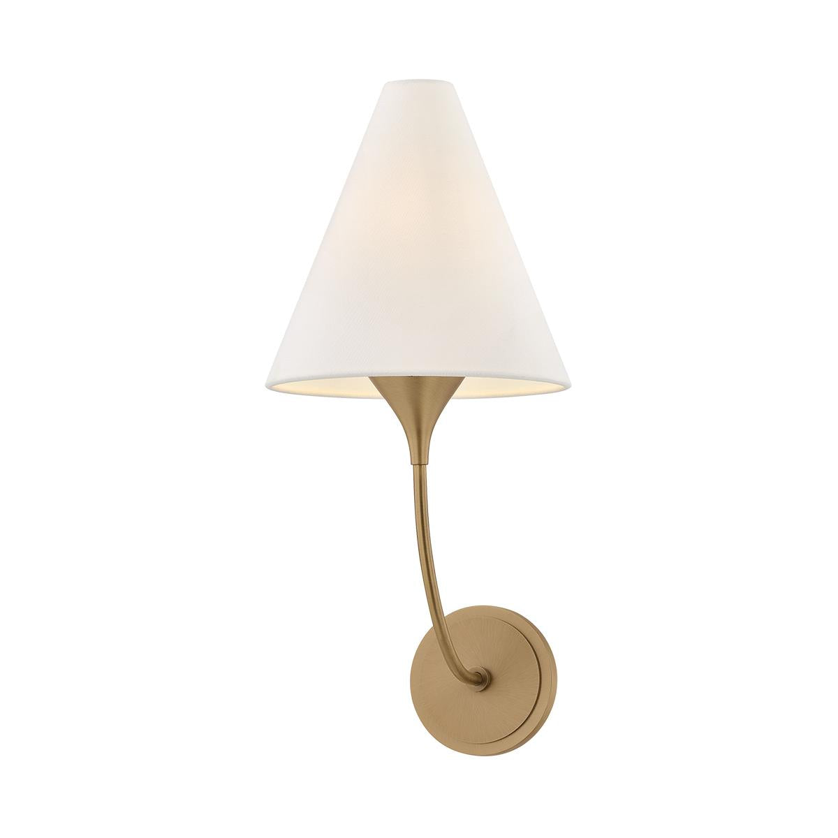Evermore brass wall sconce with a curved arm and tapered white linen shade.