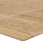 Bezem hand-knotted wool rug in beige with a textured, ribbed geometric pattern.