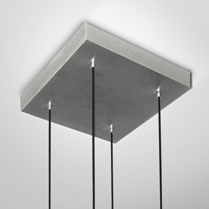 Square brushed metal ceiling canopy with four black hanging cables for the Muto pendant chandelier.