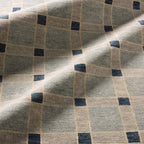 Cera Tiles hand-knotted wool rug with a blue and grey geometric grid pattern