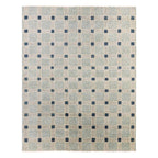 Cera Tiles hand-knotted wool rug with a blue and grey geometric grid pattern