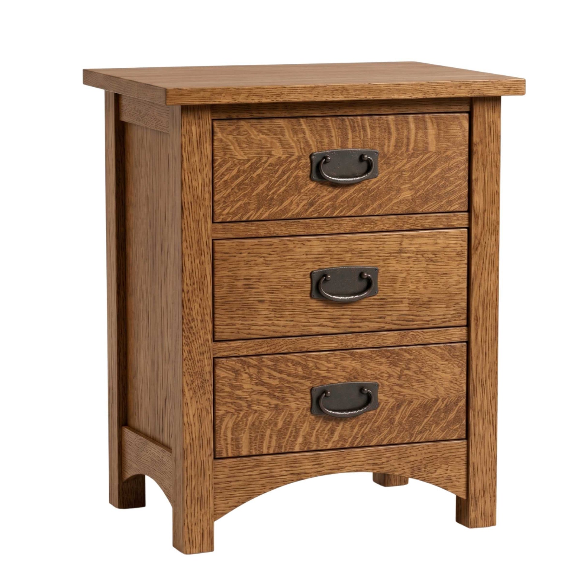 Claremont Mission solid oak nightstand with three drawers and dark metal pulls in a warm finish.