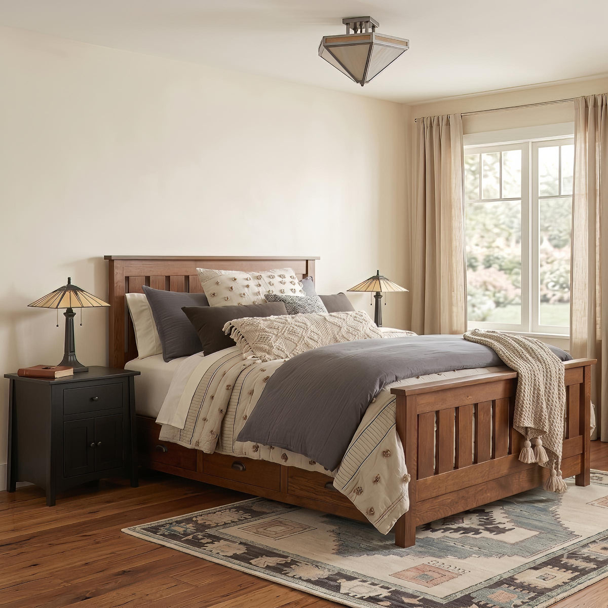 Gotham Mission-style table lamps with yellow art glass shades on nightstands in a bedroom.