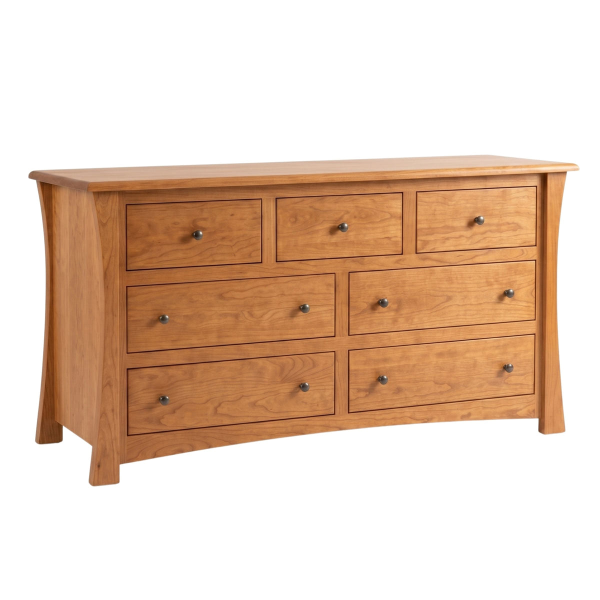 Contemporary 7-drawer cherry wood dresser with curved side panels and metal knobs.