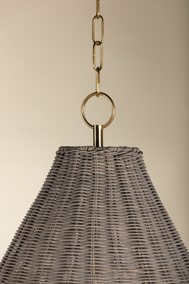 Destiny Pendant light with gray woven wicker shade and aged brass chain.