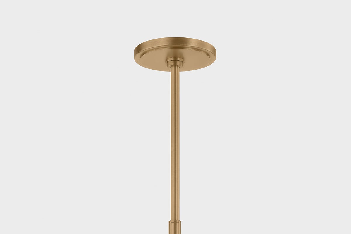 Patina brass ceiling canopy and downrod for the Evermore Chandelier.