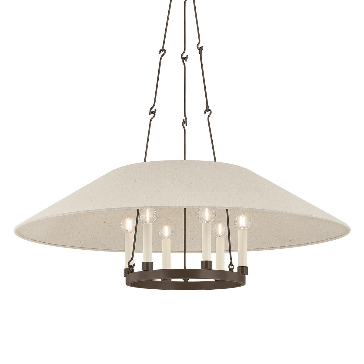 Archive bronze chandelier with cream linen shade and candle-style lights.