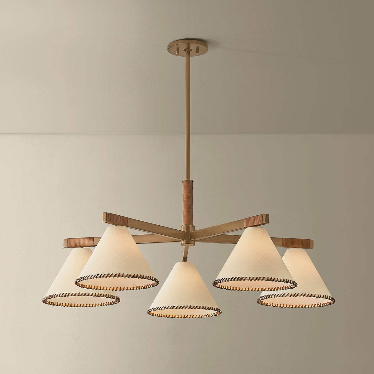 Stoney 5-light brass chandelier with whip-stitched white linen shades and jute wrap details.