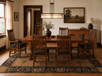 Franklin Trestle Table in solid wood with matching Mission-style dining chairs.