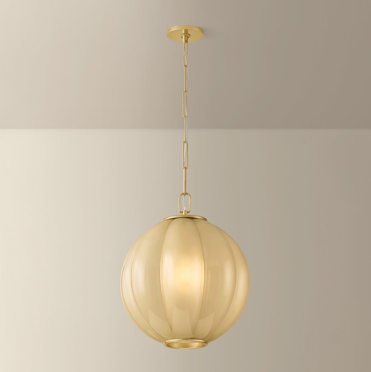 Bernadine pendant light with scalloped cream glass shade and aged brass chain hardware