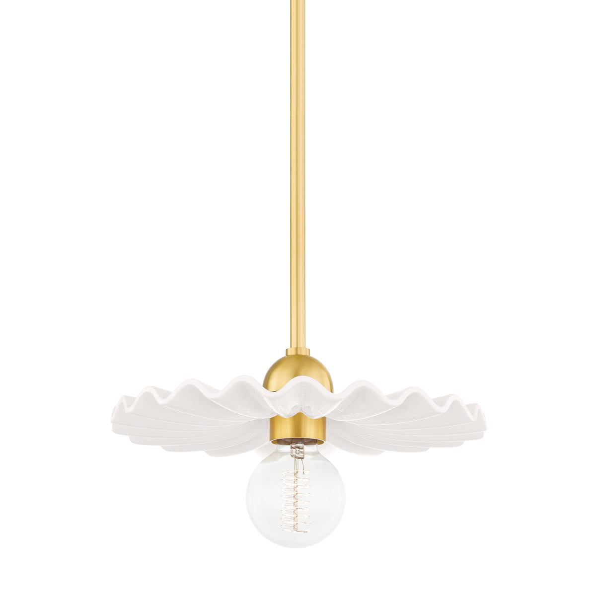 Tinsley pendant light with ruffled white ceramic shade, brass stem, and exposed bulb.