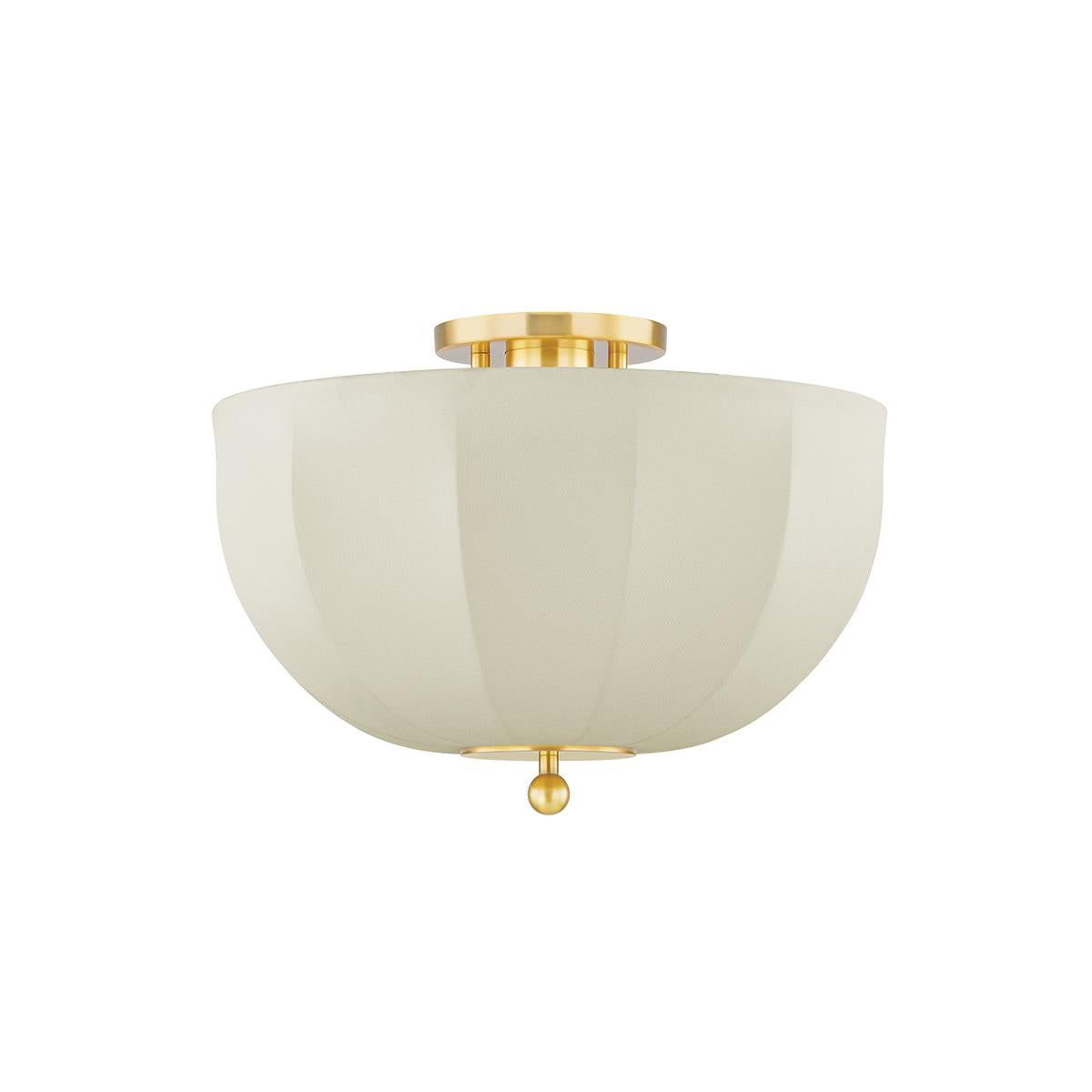 Meshelle flush mount ceiling light with a cream umbrella-shaped shade and aged brass accents.