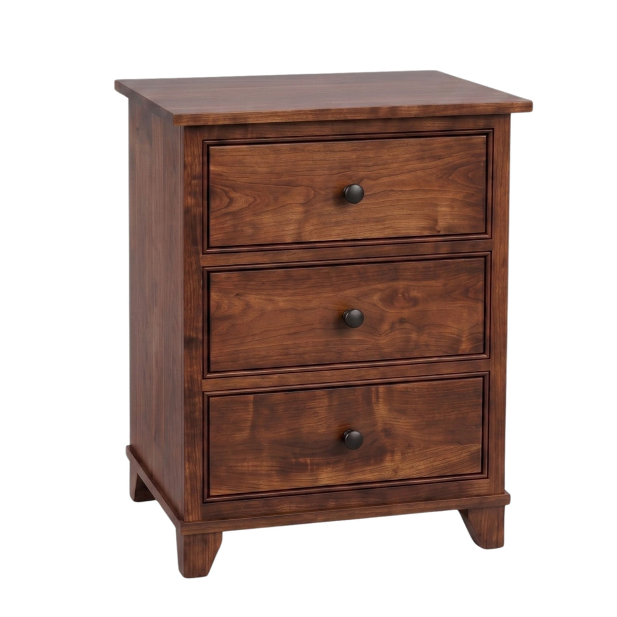 Hyland Park cherry wood nightstand with three drawers and black round knobs.
