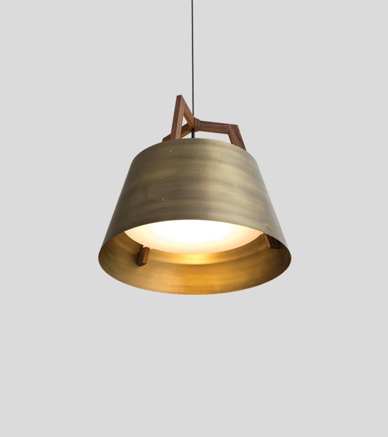 Imber Pendant light with a brushed brass dome shade and walnut wood accent.