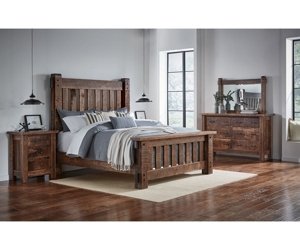 Mountain Roughsawn 6-drawer dresser in a rustic bedroom set with a matching wooden bed and nightstand.