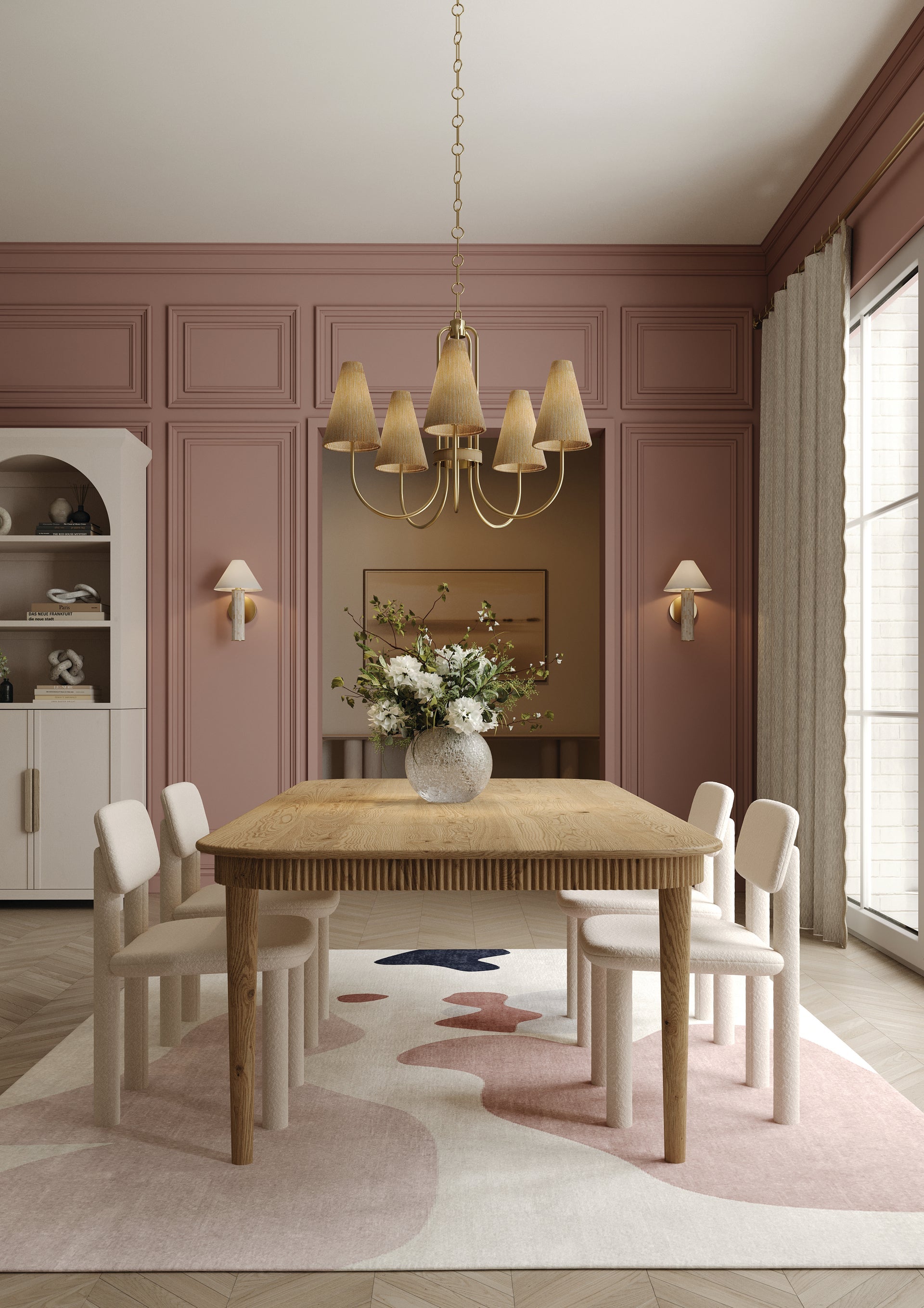 Jessel Chandelier with aged brass arms and grasscloth shades over a dining table.
