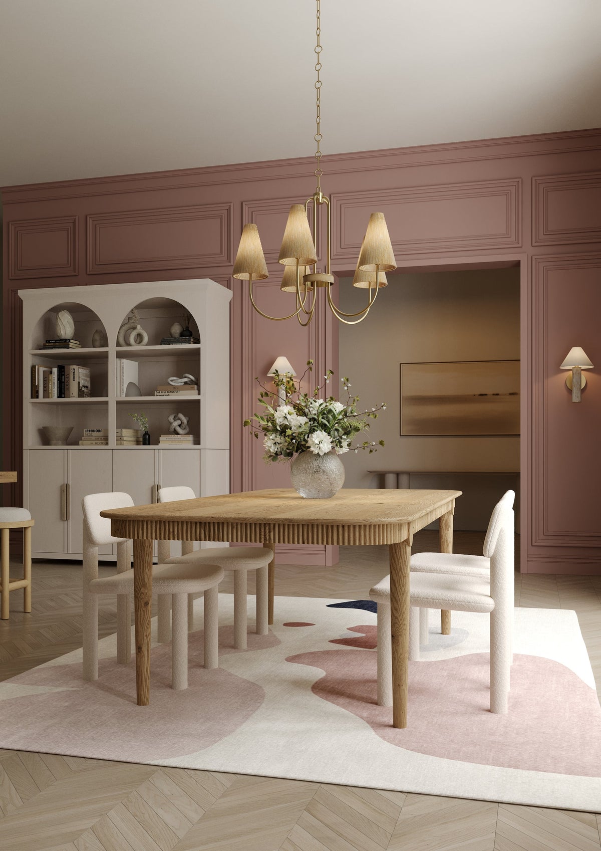 Jessel brass chandelier with grasscloth shades over a dining table