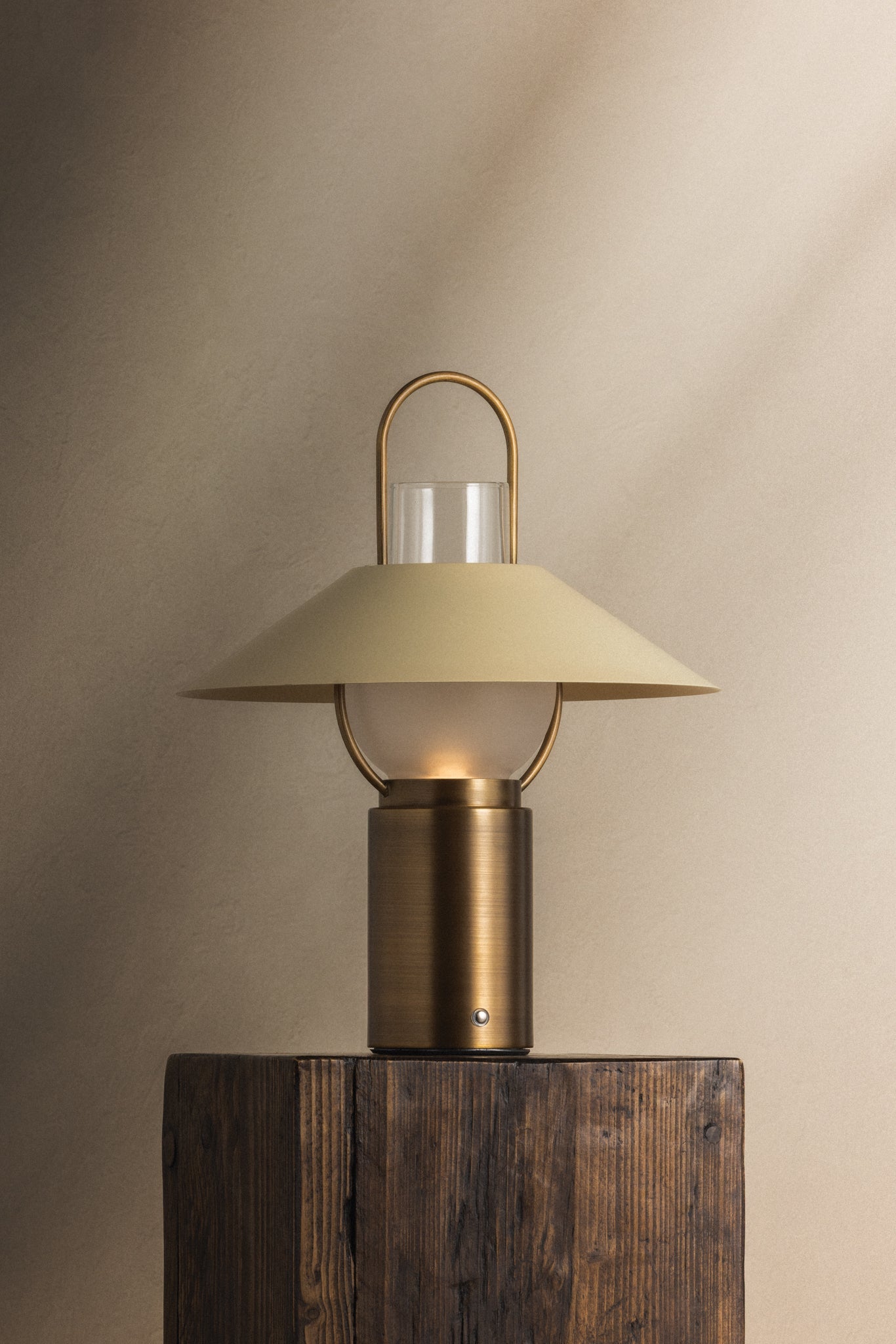 Kindle brass rechargeable table lamp with a soft sand shade and carry handle