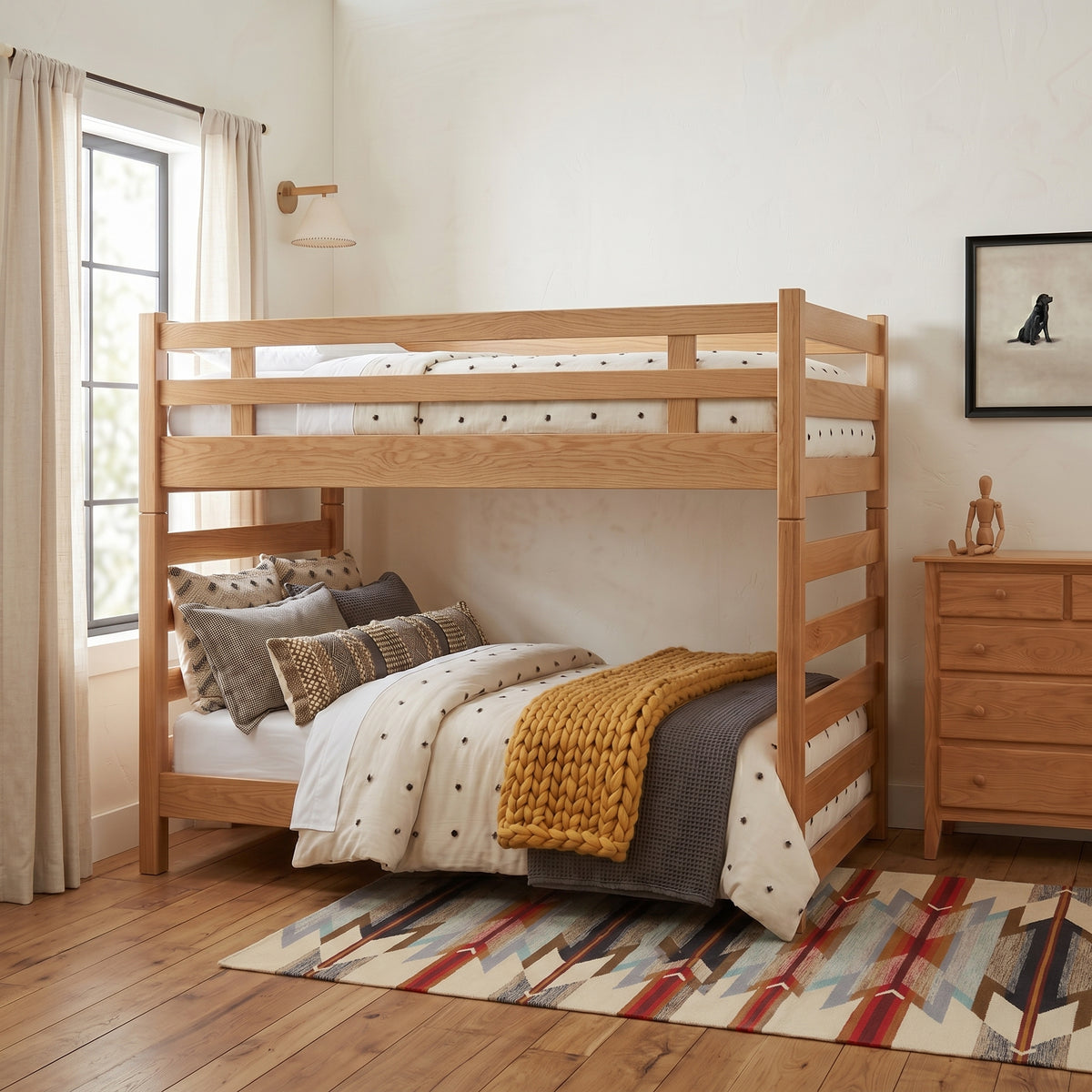 Pendleton Wyeth Trail wool rug with a colorful Southwest pattern under a wooden bunk bed