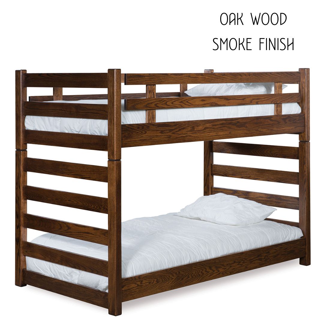 Oak wood bunk bed with a smoke finish and white bedding.