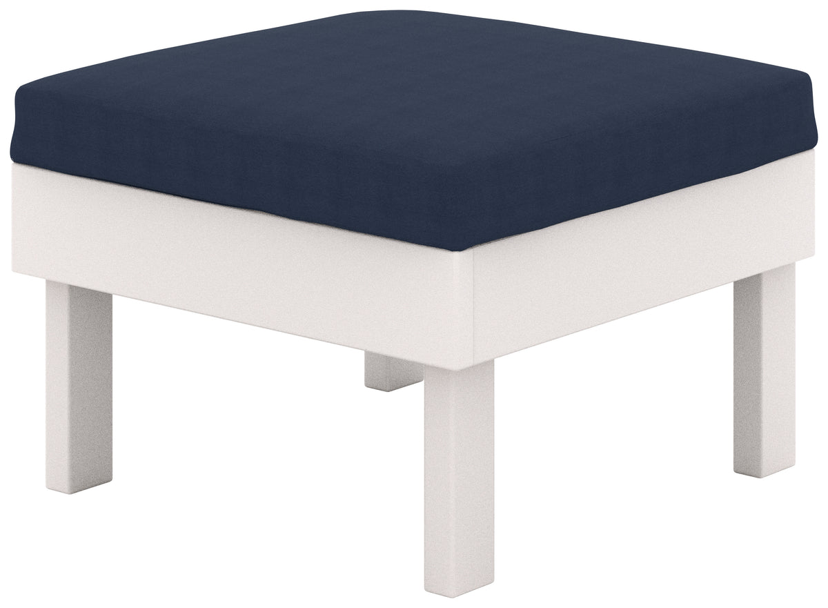 Contemporary outdoor ottoman with a white frame and indigo blue cushion.