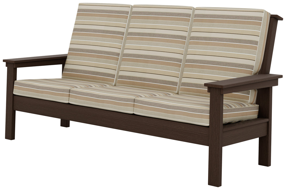 Contemporary outdoor sofa in Brazilian Walnut with striped Milano Char cushions.