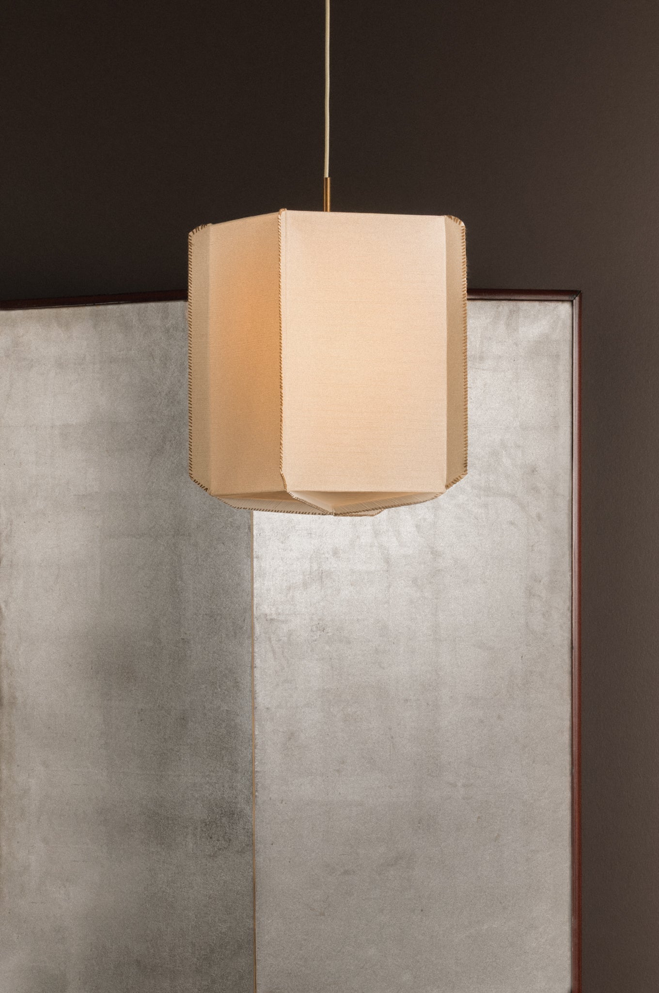 Louise 1-light pendant with a Japanese rice paper shade and whipstitch details.
