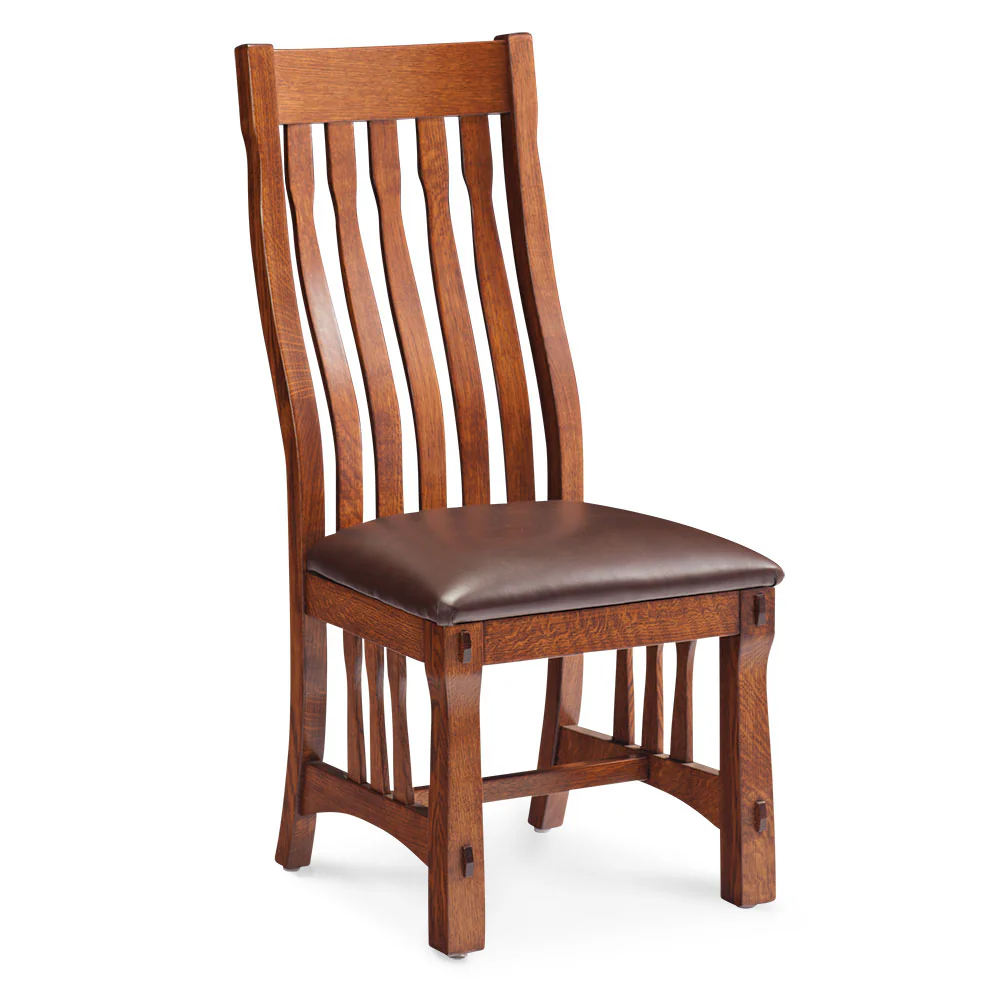 MaRyan craftsman style solid oak side chair with brown leather seat and slat back.