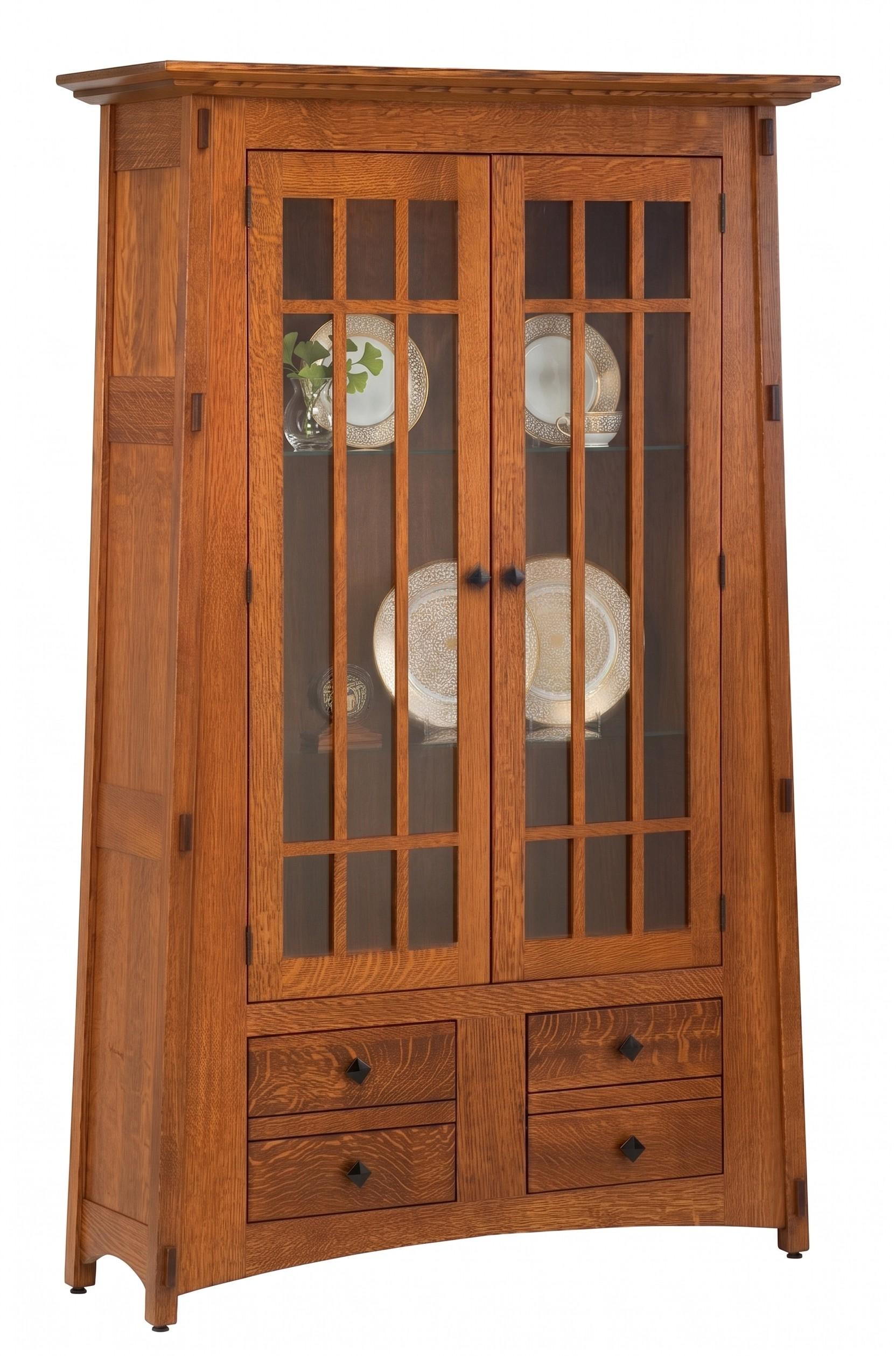 McCoy Craftsman oak bookcase with glass doors, display shelves, and lower drawers.