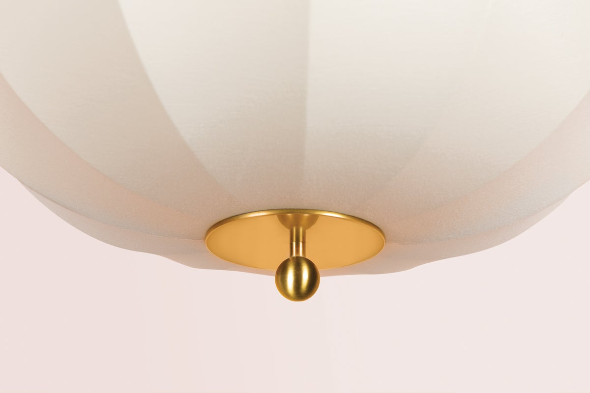 Meshelle pendant light featuring a white scalloped shade and an aged brass bottom finial.