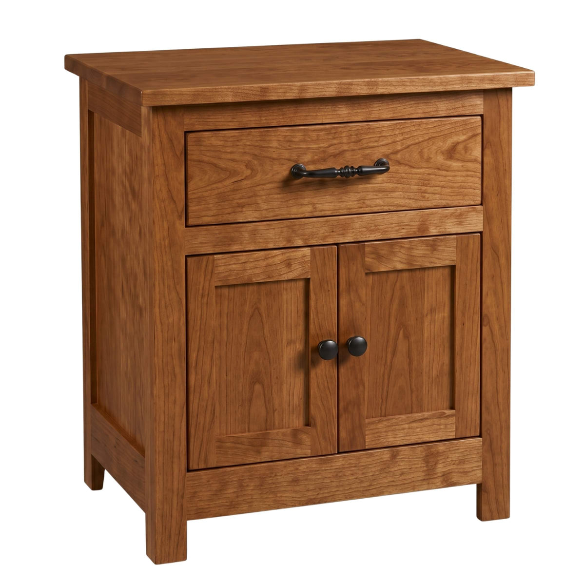 Mission style wooden nightstand with one drawer and two lower cabinet doors.