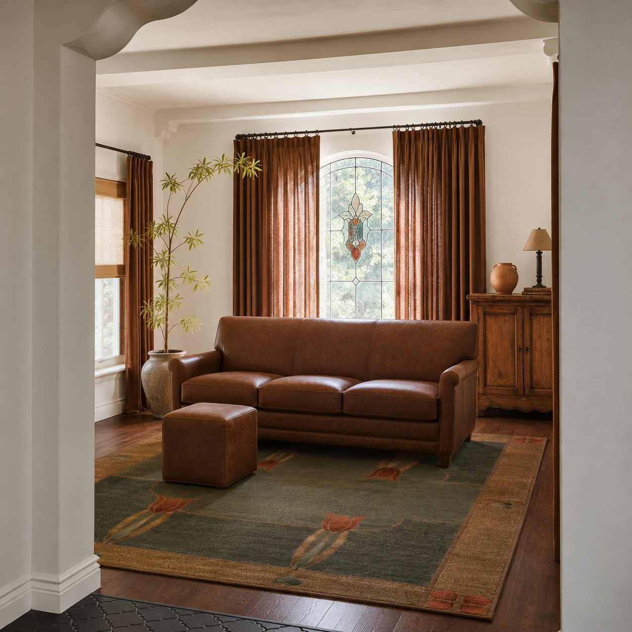 Monterey Mist Stickley green wool rug with tulip motif in a living room.