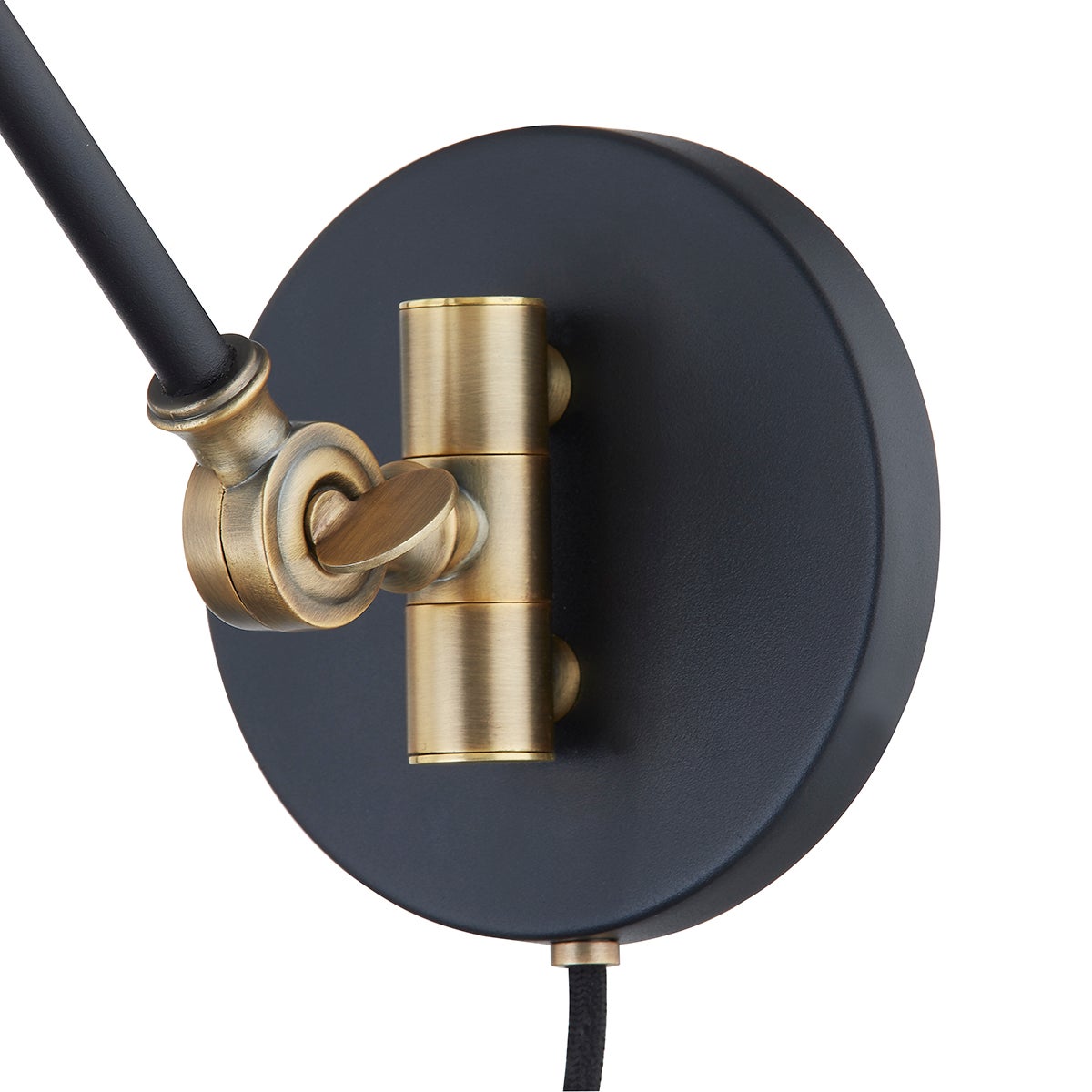 Navin plug-in sconce with textured black backplate and adjustable patina brass joint.