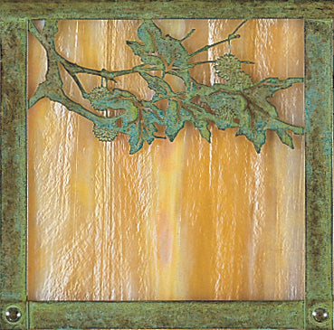 Evergreen filigree wall mount in verdigris patina with gold white iridescent glass.