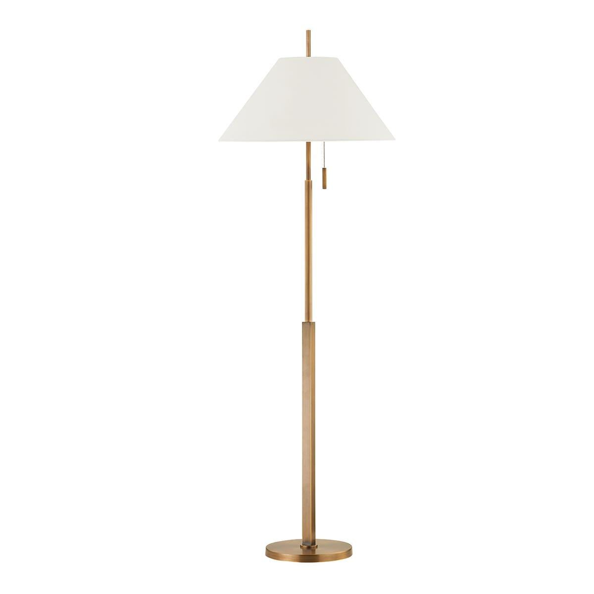 Clic brass floor lamp with a tapered white linen shade and pull chain.