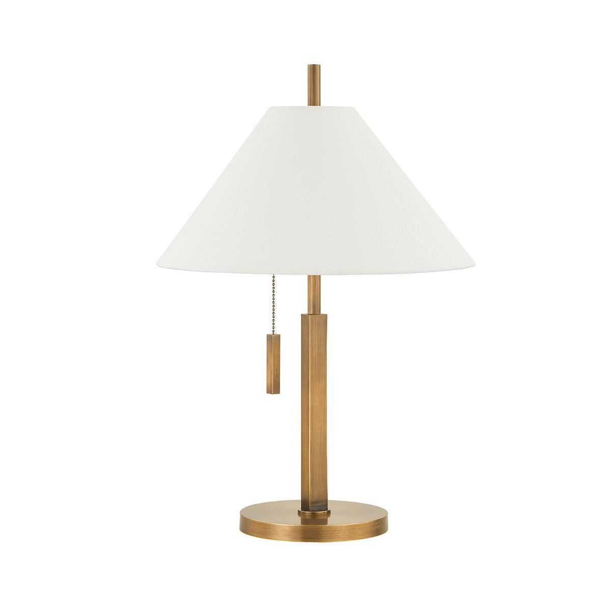Clic table lamp in patina brass with a tapered white linen shade and pull chain.