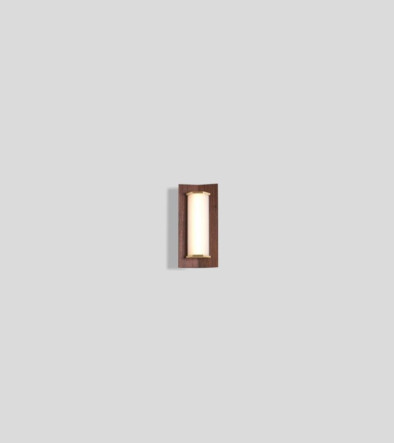 Penna Sconce in solid walnut with a glowing LED light panel and brass accents.