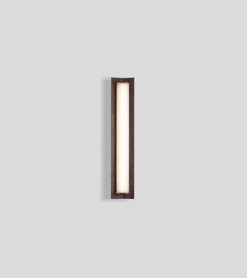Penna Sconce in solid walnut with a glowing LED light panel and brass accents.