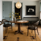 Prairie Border hand-knotted wool rug in golden-camel with chocolate and burgundy accents.
