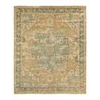 Rhapsody orange hand-knotted wool and viscose rug with a muted traditional pattern.