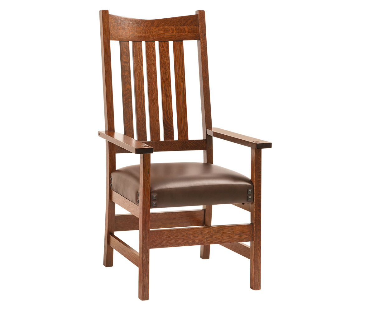 Conner Craftsman style oak arm chair with a brown leather seat.