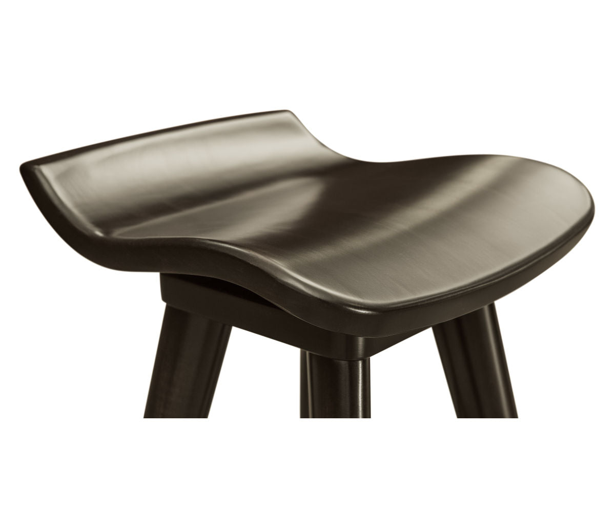 Lambert dark wood memory swivel barstool with a contoured saddle seat.
