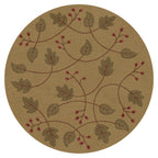 Round beige wool rug with a botanical pattern of green leaves and red berries on vines.