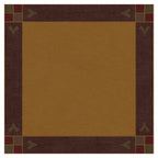 Paradise Valley Stickley wool rug in gold with a dark brown and green border.